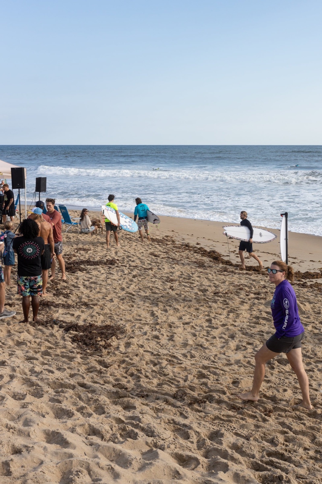 Competitors head down the beach between heats